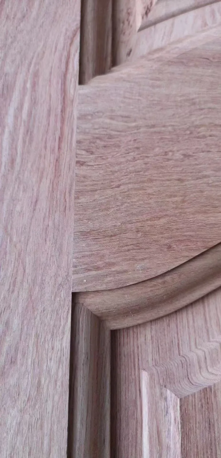 Close view of wooden carved panel detailing
