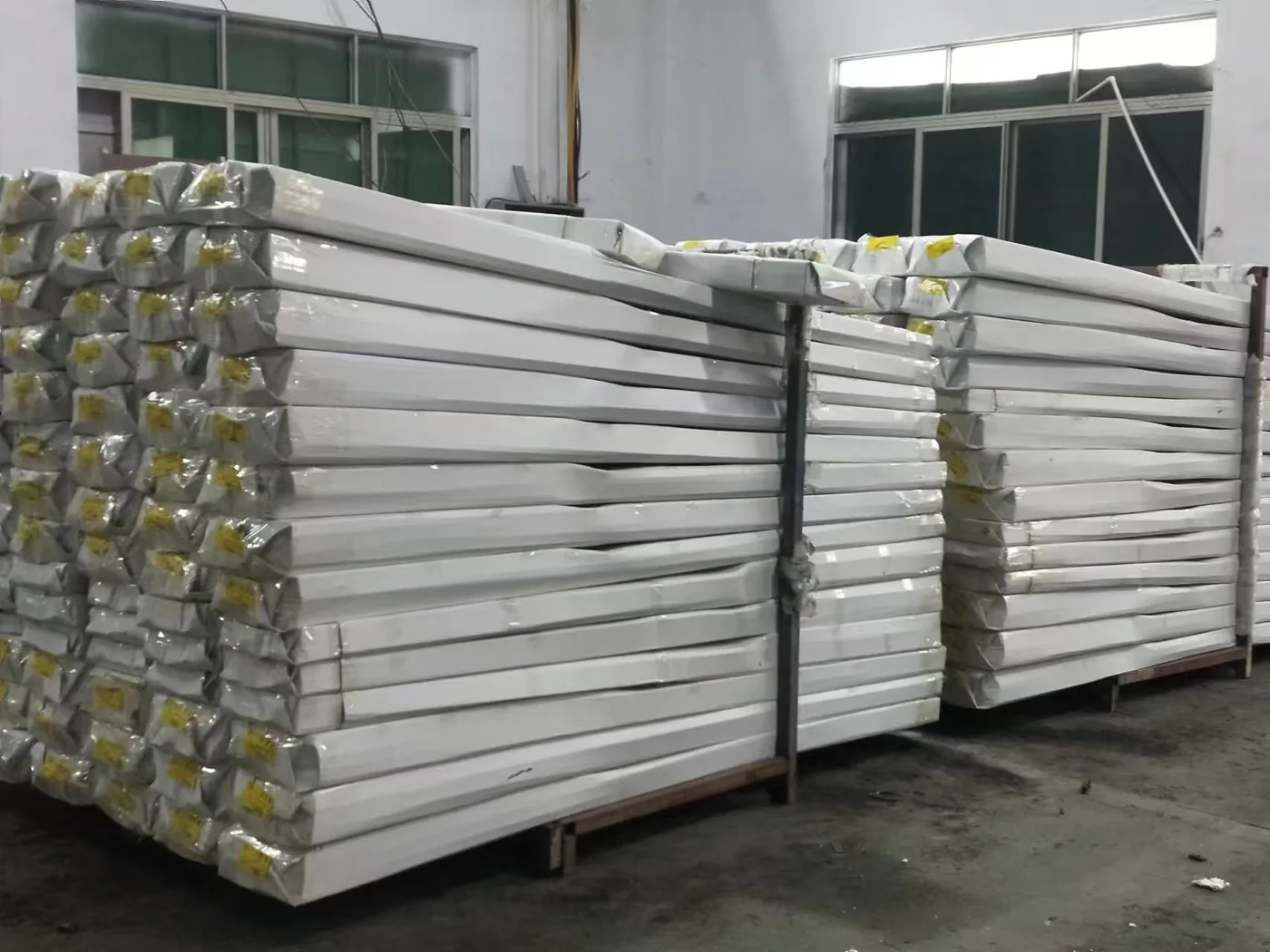 Wrapped door components stacked together